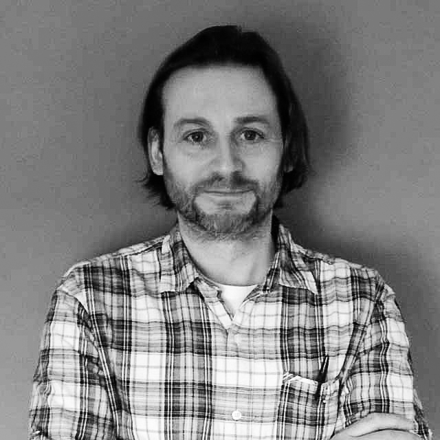 Christian Azzola's headshot photograph.